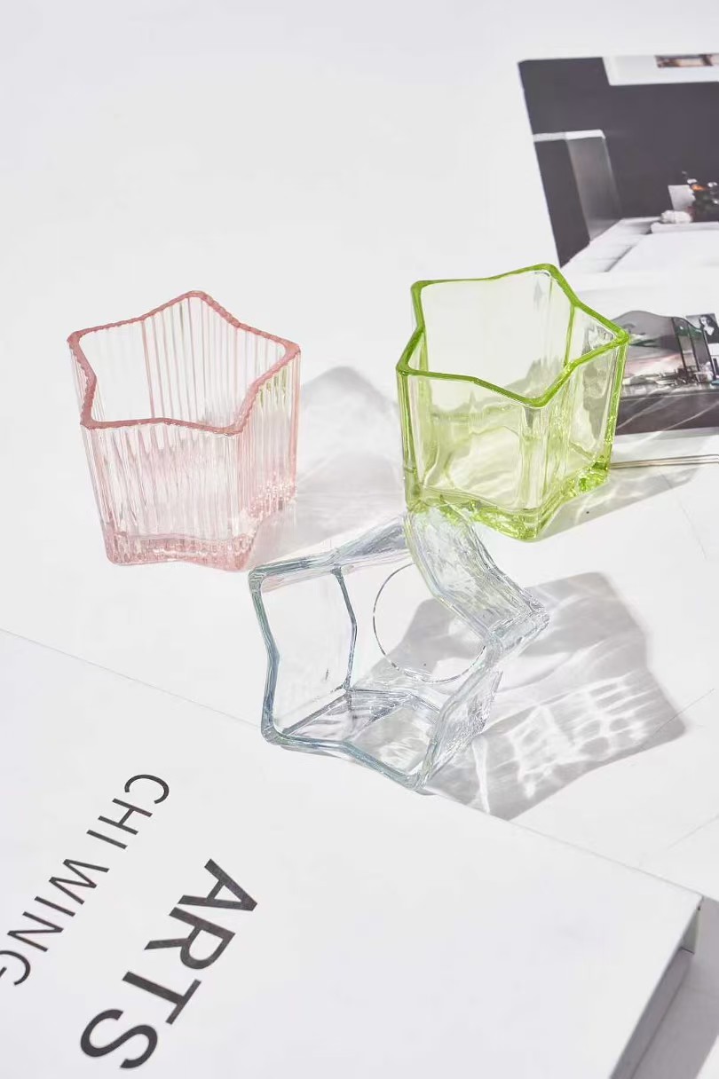 Stjerneformet lysestake i glass